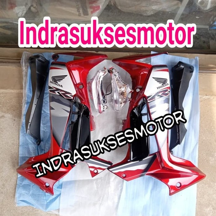 sayap body depan motor supra x 125 berikut lampu sen