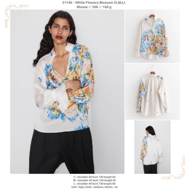 Blouse jumbo silky putih motif bunga-bunga