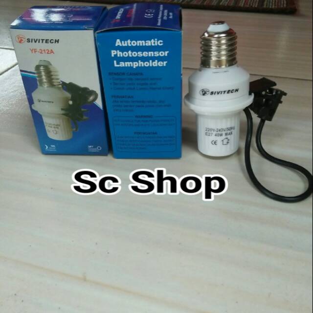 Fiting lampu sensor otomatis siang malam