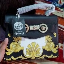 tas versace