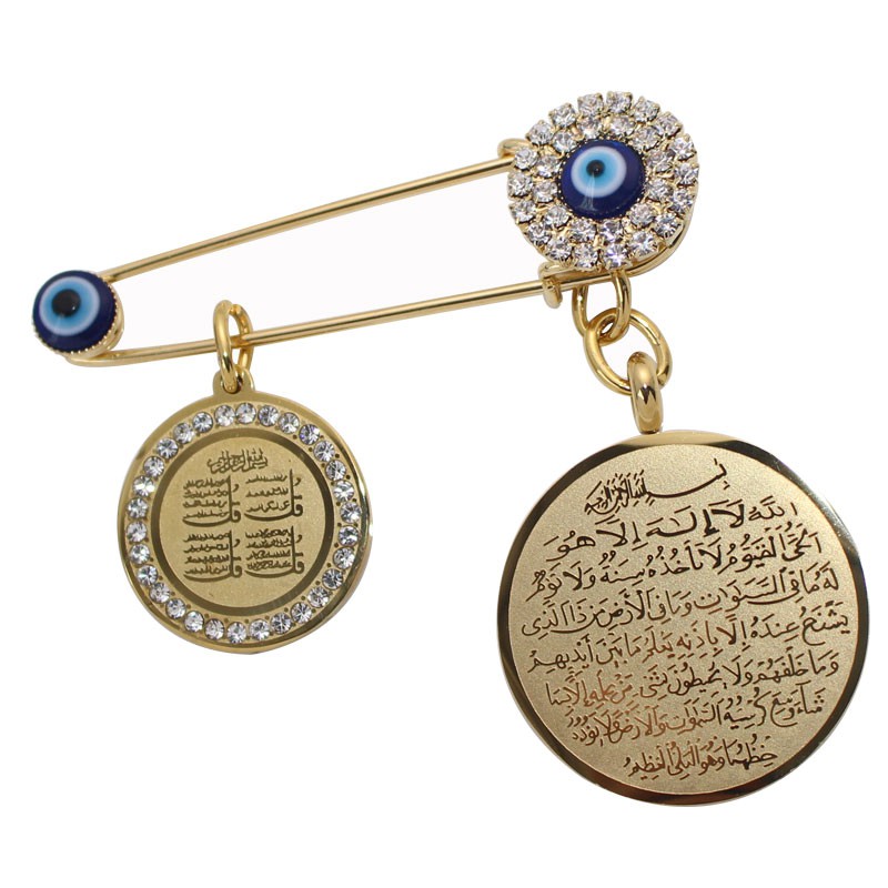 four Qul brooch