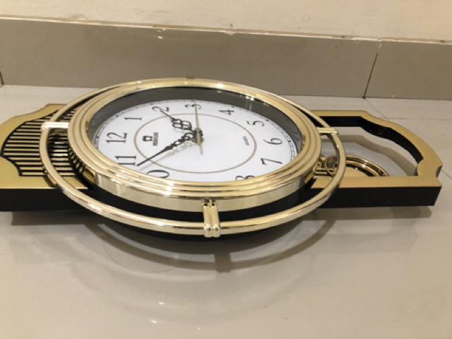 Jam Dinding Mirado Musik Bandul Goyang 937 Diameter 33cm