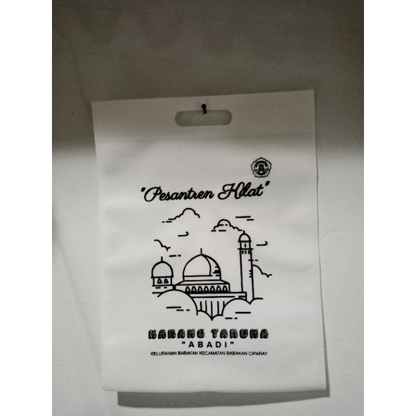 TAS SPUNBOND OVAL CUSTOM SABLON 30X40 TAS PROMOSI TOKO TAHLIL WEDYNG  PROMOSI TOKO HP