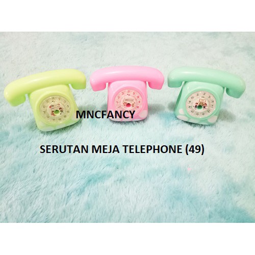 

rautan/serutan meja telephone (49)