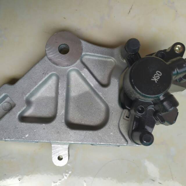 KALIPER CAKRAM BELAKANG TIGER REVO