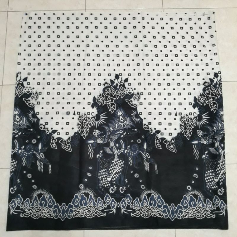 Sarung batik motif wayang putih