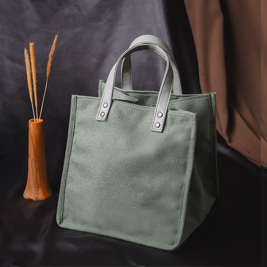 

Tas Goodie Bag Souvenir Wedding Karung Goni Kanvas Handle Kulit - Hampers Lebaran Idul Fitr