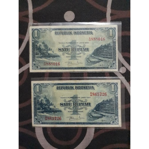 uang kertas 1 rupiah pemandangan alam