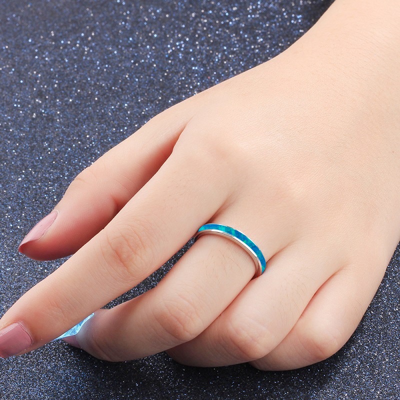 Simple single circle blue opal ring