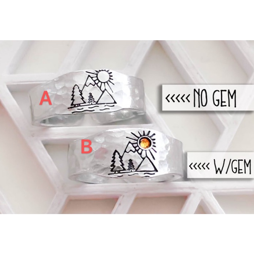 Creative winter snow scene warm sun snow fir tree couple European and American rings