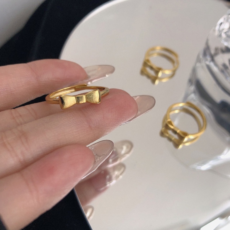 Cincin Model Terbuka Desain Pita Warna Gold Matte Gaya Uniksimple Untuk Wanita