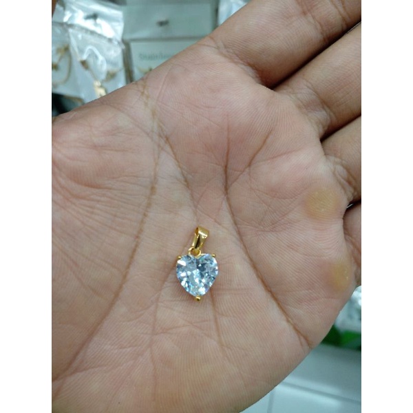 Liontin Titanium gold mata putih