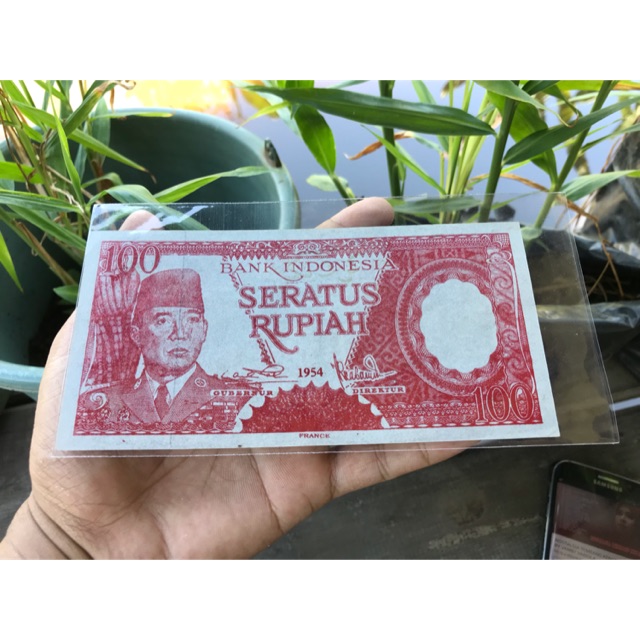 Uang Kuno 100 Rupiah Soekarno Seri Cantik BK133333 Tahun 54