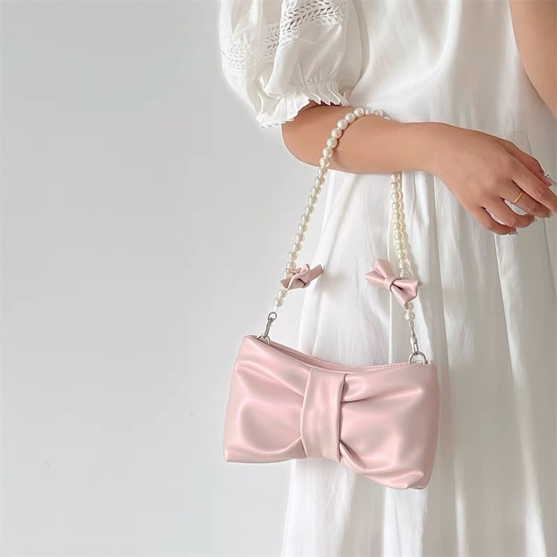 [ready stock] keysa ribbon bag | tas wanita pearl bahu selempang shoulder sling bag bentuk pita warna pink muda metalic putih tali mutiara