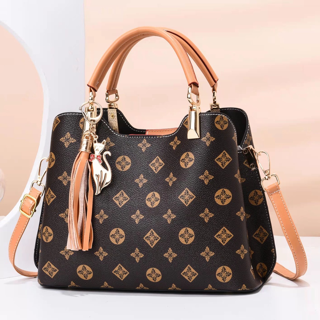 MV_Marvelouz MV303444 Tas HANDBAG Motif Wanita Modis Muat Banyak Ada Talpan/Gantungan 1kg bisa 2tas supplier import