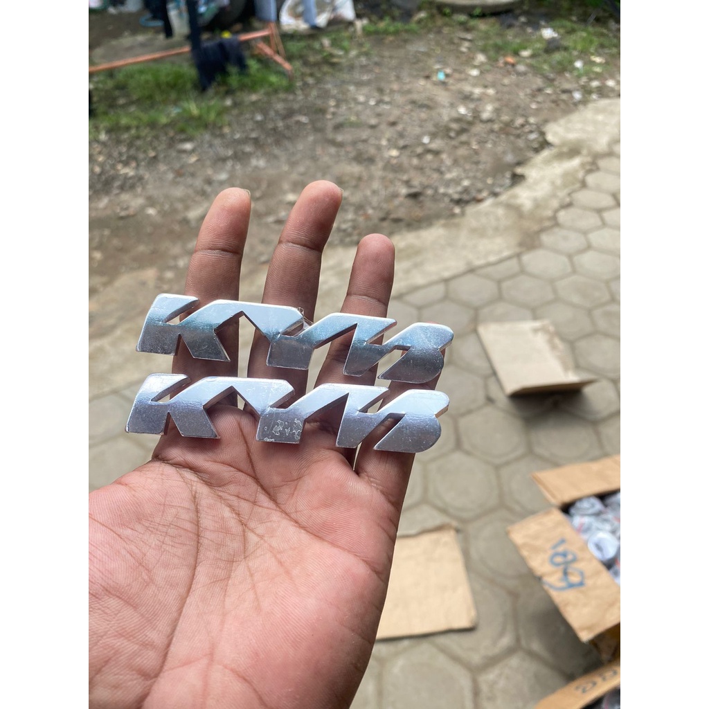 EMBLEM SKOK LOGO SHOCK DEPAN KYB SHOCK DEPAN KYB BOTTOM SKOK UNIVERSAL termurah logo kyb logo shok k