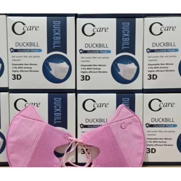 Masker duckbill 3ply Ccare untuk dewasa warna merah muda/pink harga per dus isi 50 pcs ( plus dus )