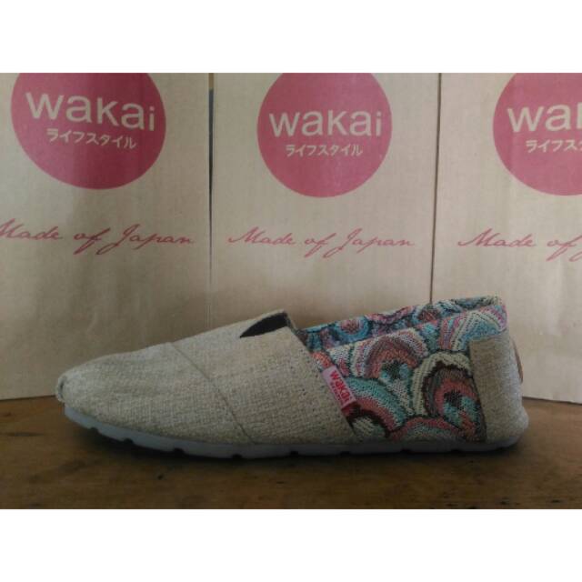 Wakai rajut cream motif ekor burung Merak grade original
