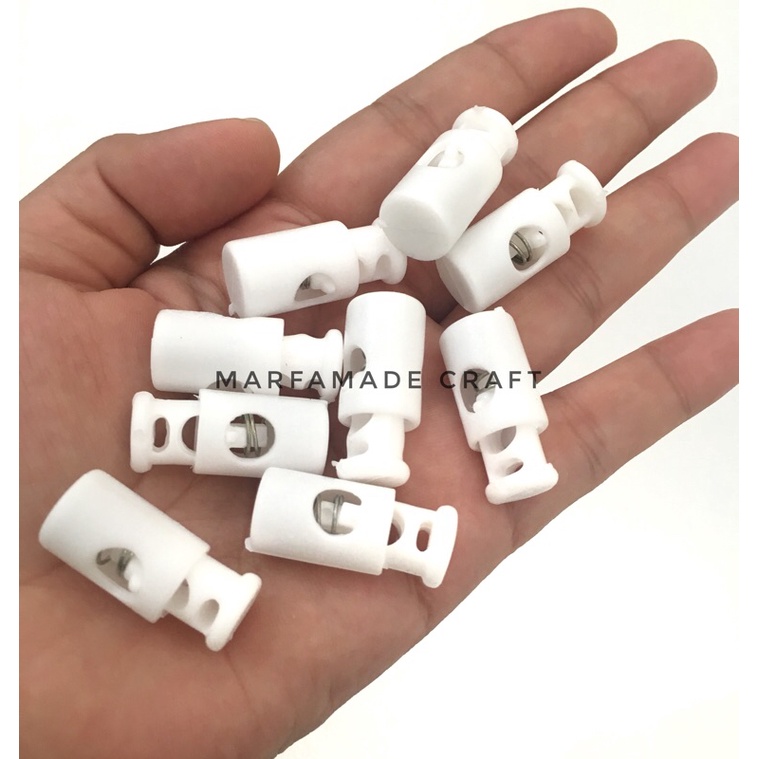 Stopper Tali 2 Lubang Model Tabung Putih per pcs