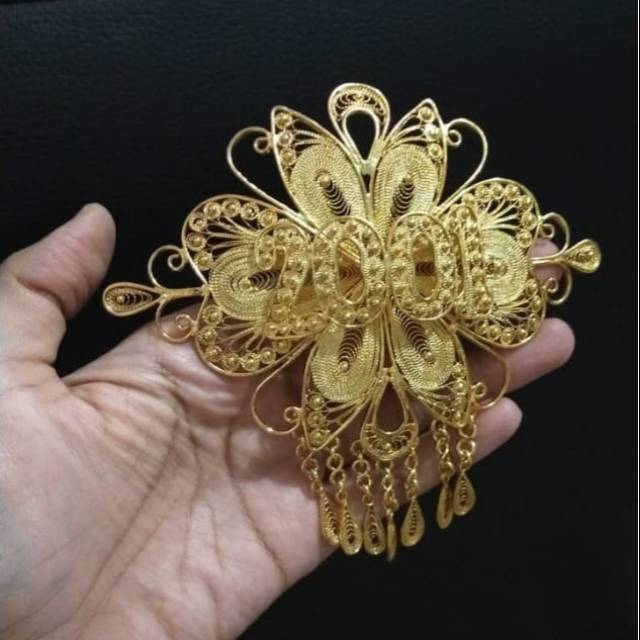 Bros tembaga mutiara