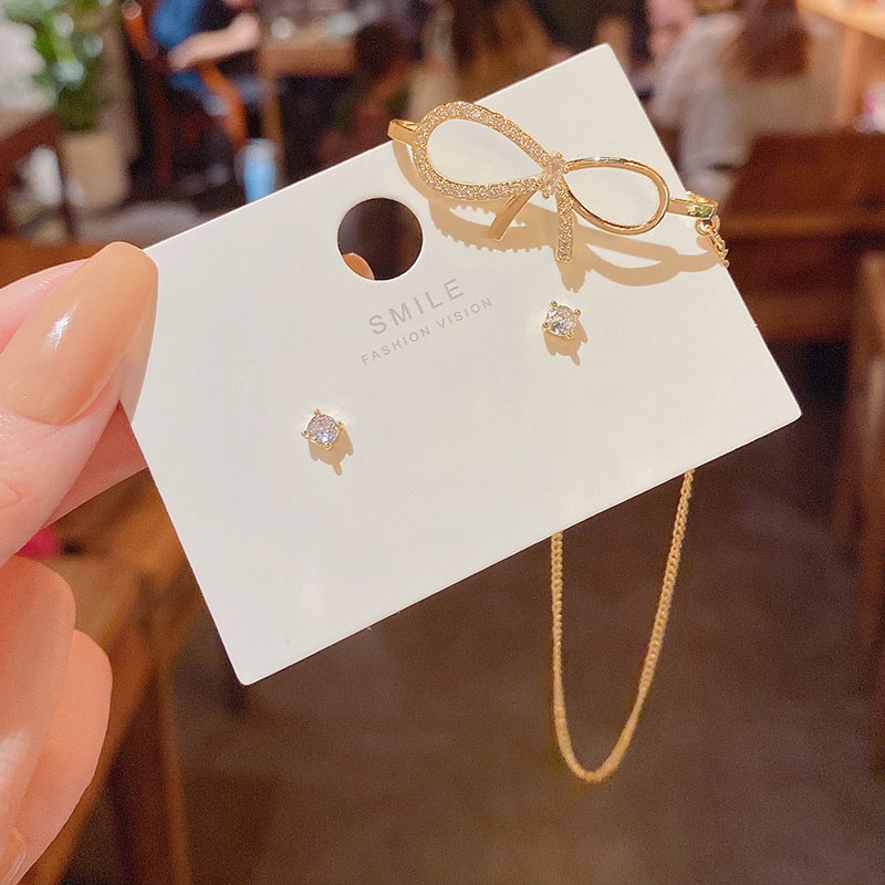 Anting Tusuk Sterling silver 925 Desain Pita Asimetris Hias Zircon Mewah Untuk Wanita