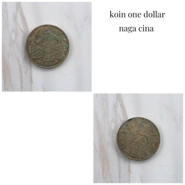 koin one dollar naga cina