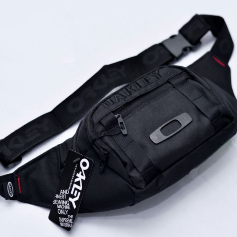 Tas Oakley Slempang Tas Surfing Oakley logo Besi / Tas waistbag distro / Tas Slempang Pria / Waistbag Pria