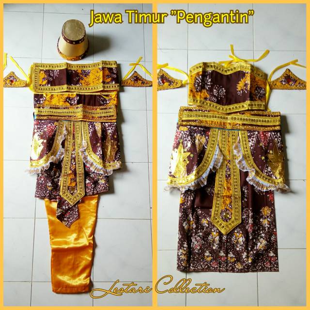 SEPASANG putra putri Baju Adat Jawa Timur Pengantin/kreasi