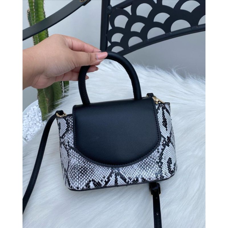 Cnk Snake Print Leather Cylinder Bag