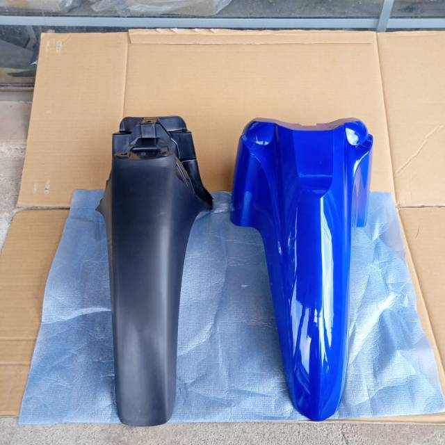 Sepakbor supra x 125 fi warna biru