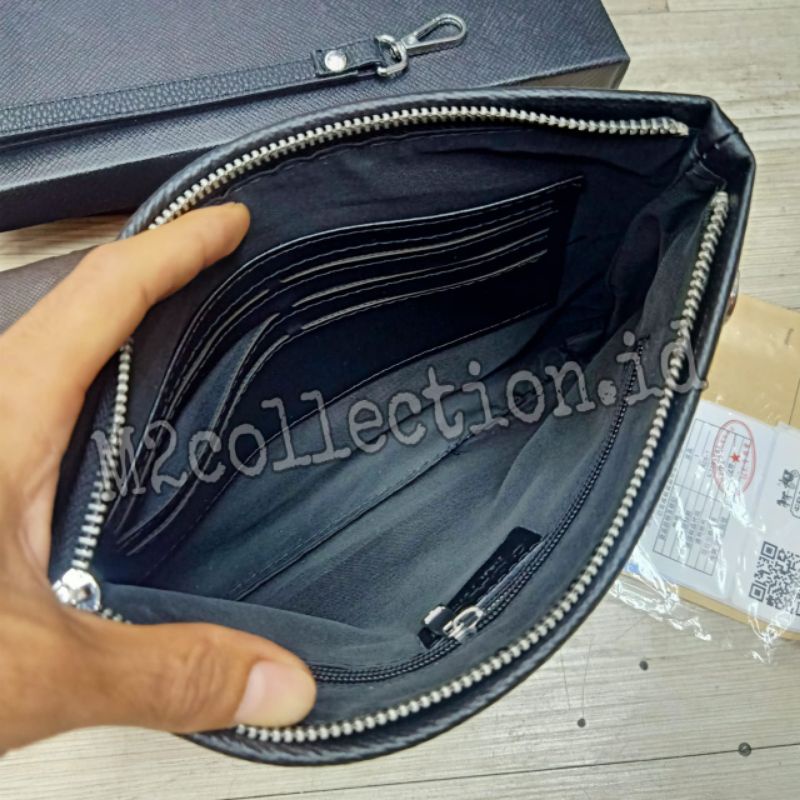 Tas Tangan Coach clutch bag/handbag Leather