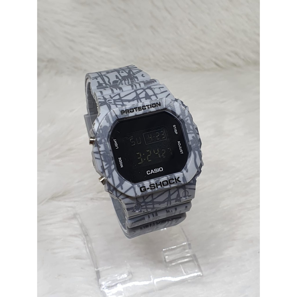 TERLARIS!!!JAM TANGAN PRIA G-SHOCK CASIO DW 5600 GS CASIO SEGI WARNA HITAM ANTI AIR DIGITAL one piece dw bunga dw loreng full hitam best seller ready stock TERIMA COD BAYAR DITEMPAT-TRIBAL ABU