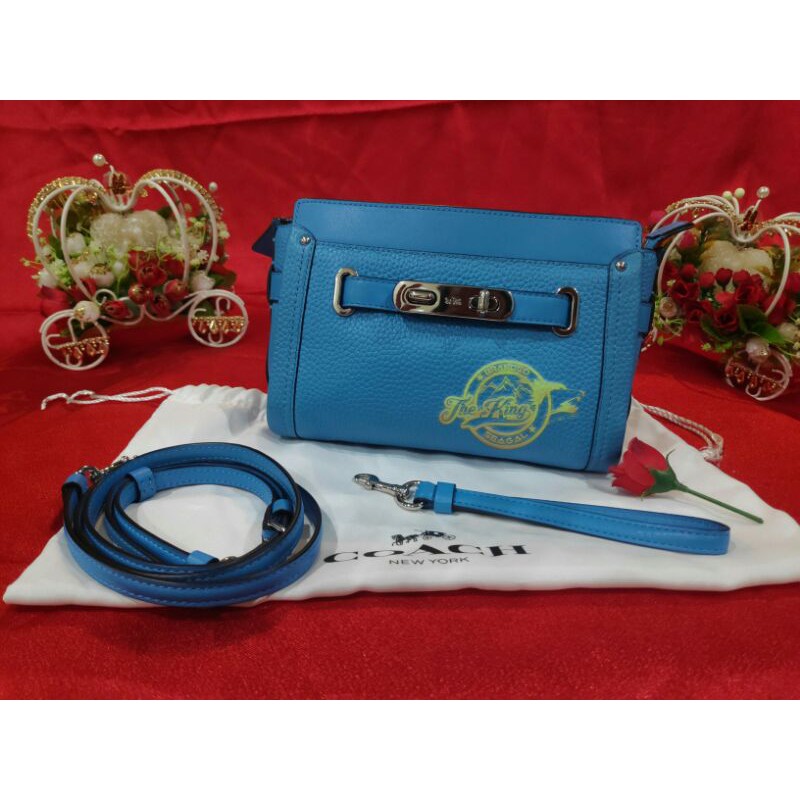 Tas Sling / CLUTCH COACH SWAGGER