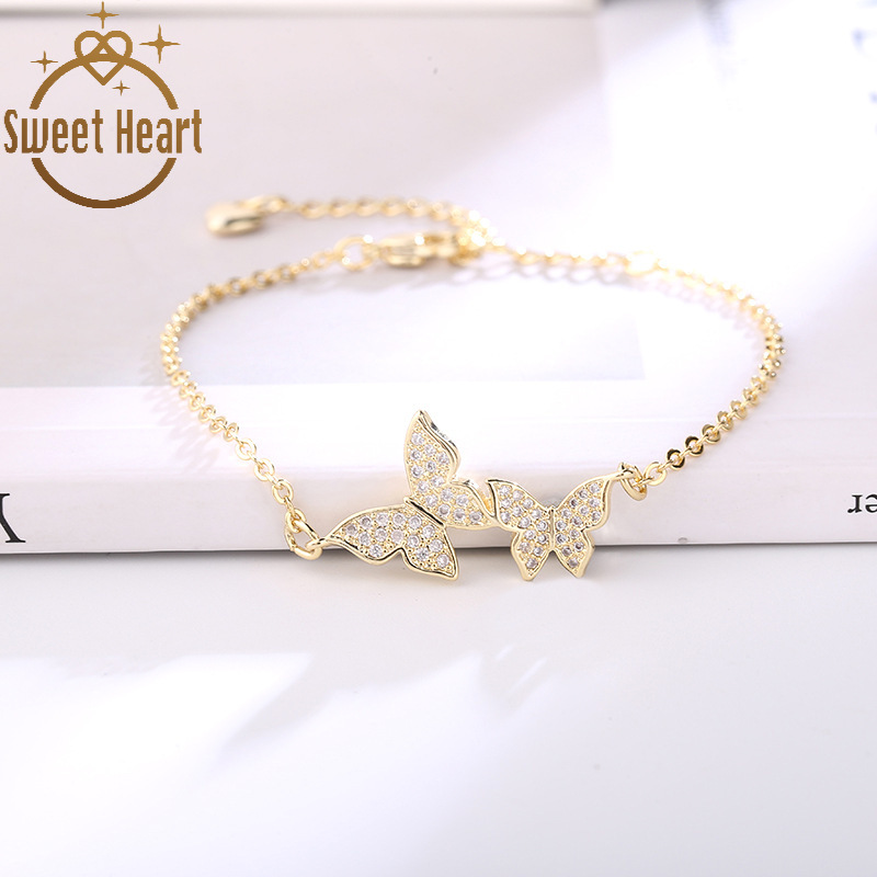 Gelang Rantai Desain Double Butterfly Bahan Cubic Zirconia Warna Emas Untuk Wanita