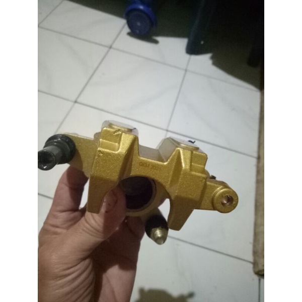 kaliper.kepala babi supra x 125 belakang