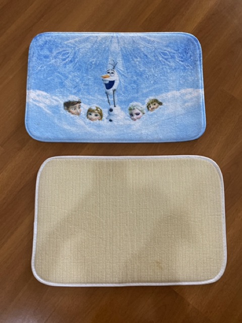 Keset/ lap kaki motif doraemon/ hello kitty/ frozen