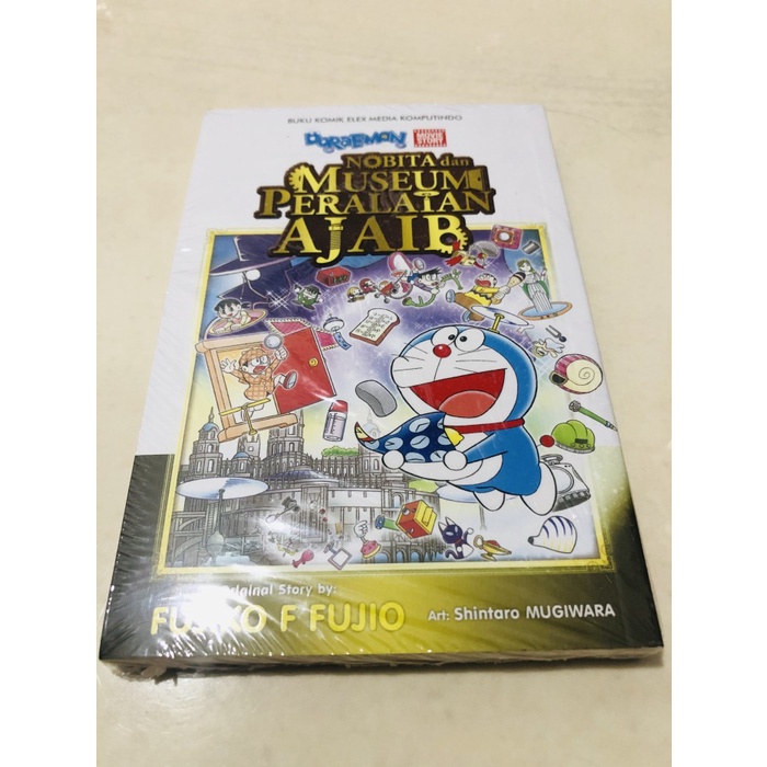 Buku komik doraemon movie story nobita dan museum peralatan ajaib