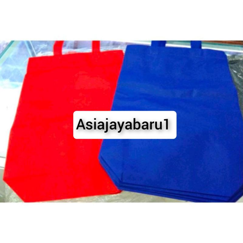 

Tas Spunbond Handle Box uk 30x35x10 / Goodie bag / Tas kain polos