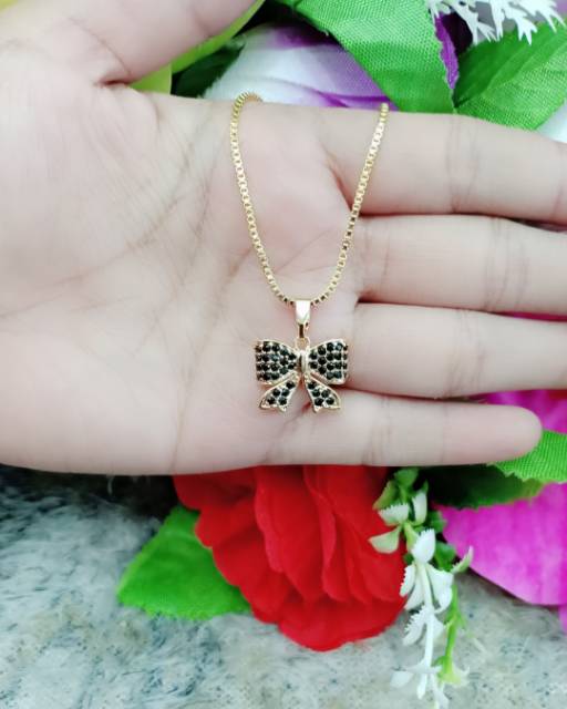 Kalung Dan Liontin pita Mata hitam A-B