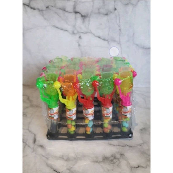 

Permen mainan goyang tok tok