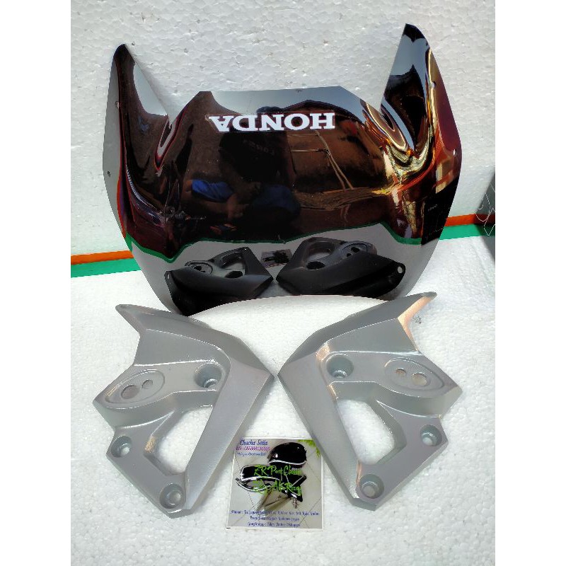 Visor garnis kupingan lampu depan Tirev Tiger Revo barong set baut emas
