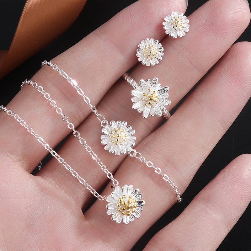 Set Kalung + Gelang + Anting + Cincin Bentuk Bunga Daisy Warna Silver Untuk Wanita