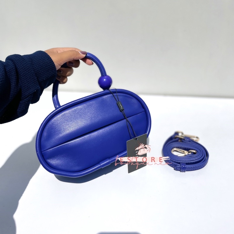 P Mini Oval Shoulder Bag