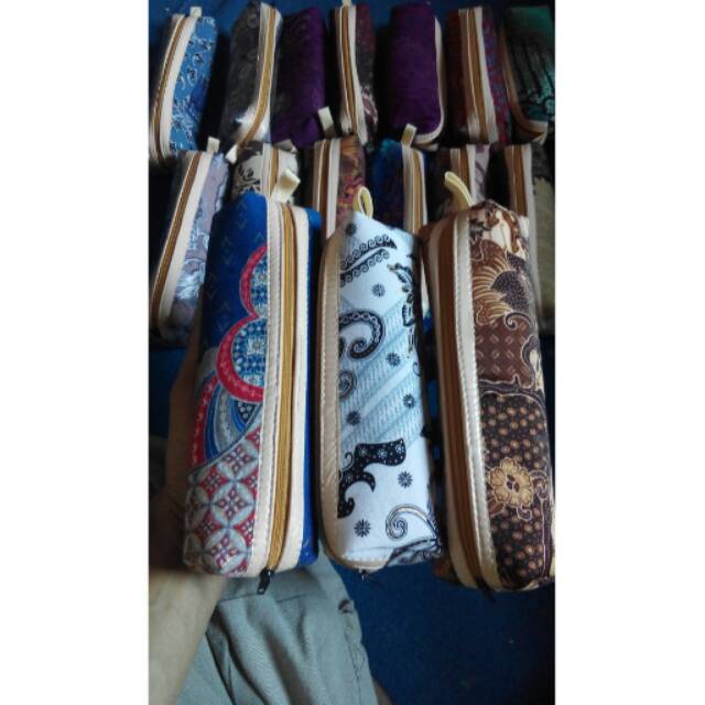 

Souvenir dompet pensil