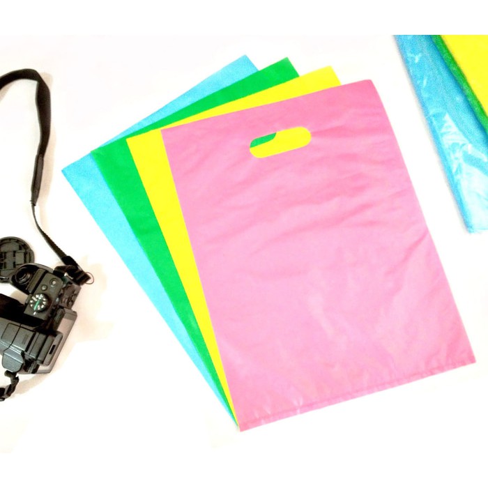 

Tas Plastik Plong Sablon Logo Toko Distro Warna Custom-PO 30cm x 40cm