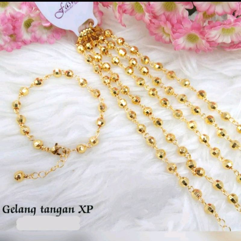 gelang xuping bola motif kaca