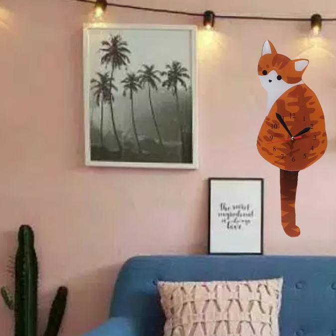 jam dinding pendulum ekor goyang kucing orange tersedia stok