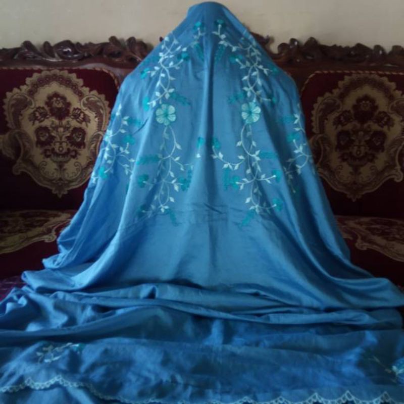 Mukena dewasa terusan warna biru bahan rayon silk bordir rambat