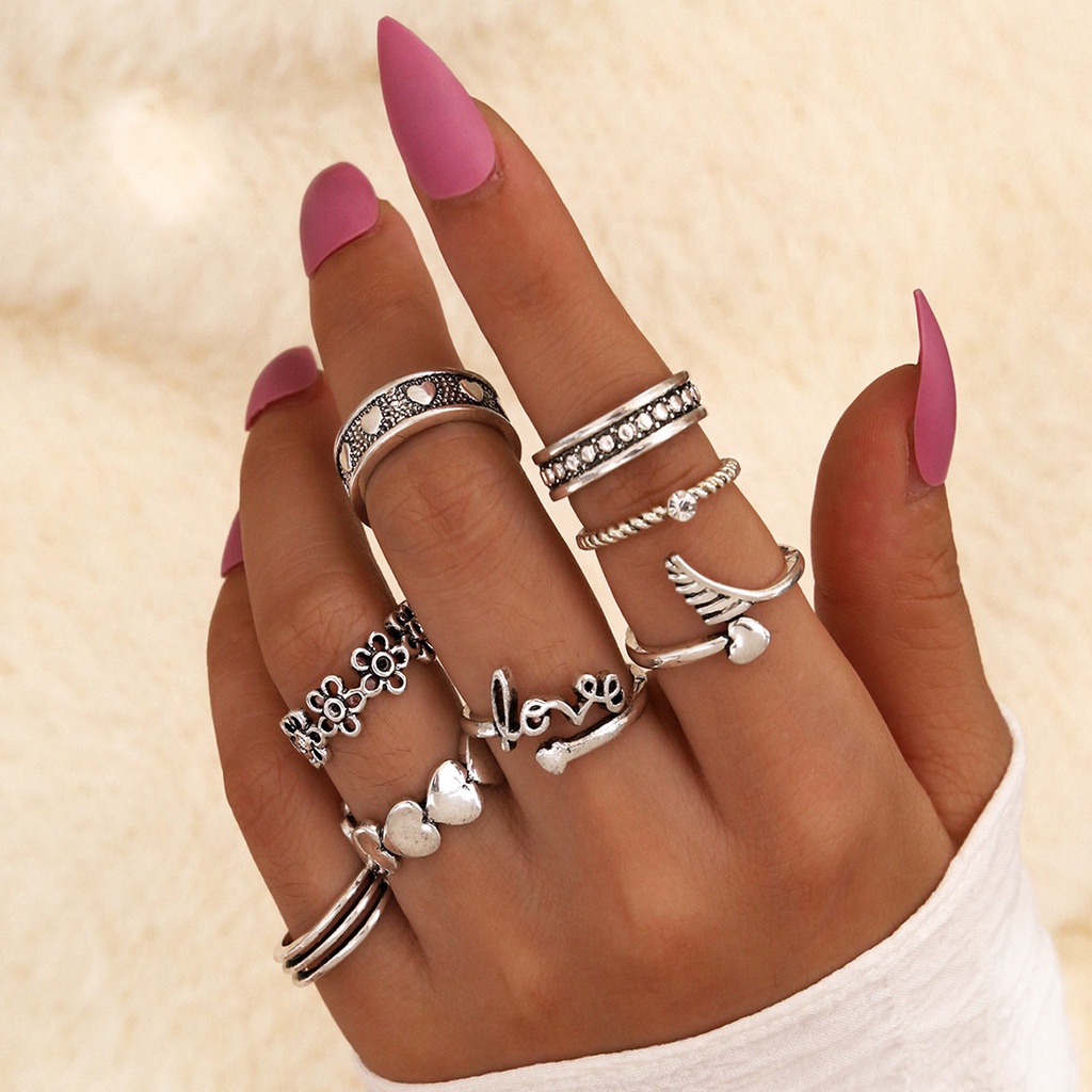 Pribadi ornamen dan bentuk sayap sedikit Daisy Bahasa Inggris love trendy cincin 8-piece set