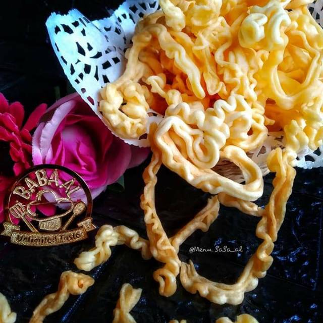

CURLY CHEESE (Krupuk Keju) sensasi ngemil krupuk dengan bahan dasar keju Kraft , Gurih dan nikmat